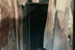 Main-Actor-Hallway-Behind-Butcher-Room-Scene